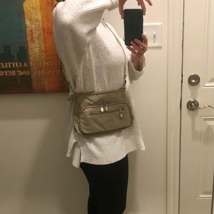 Baggallini crossbody purse with integrated wallet